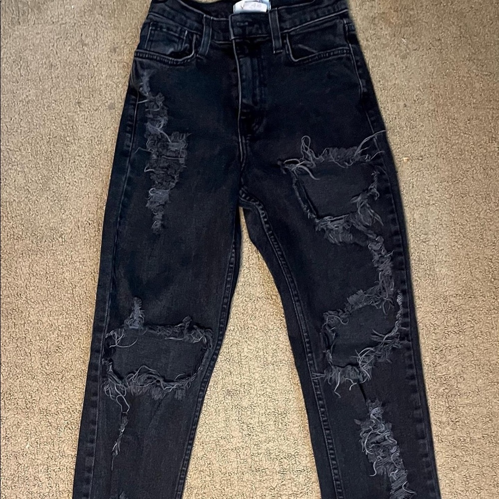 ripped black jeans